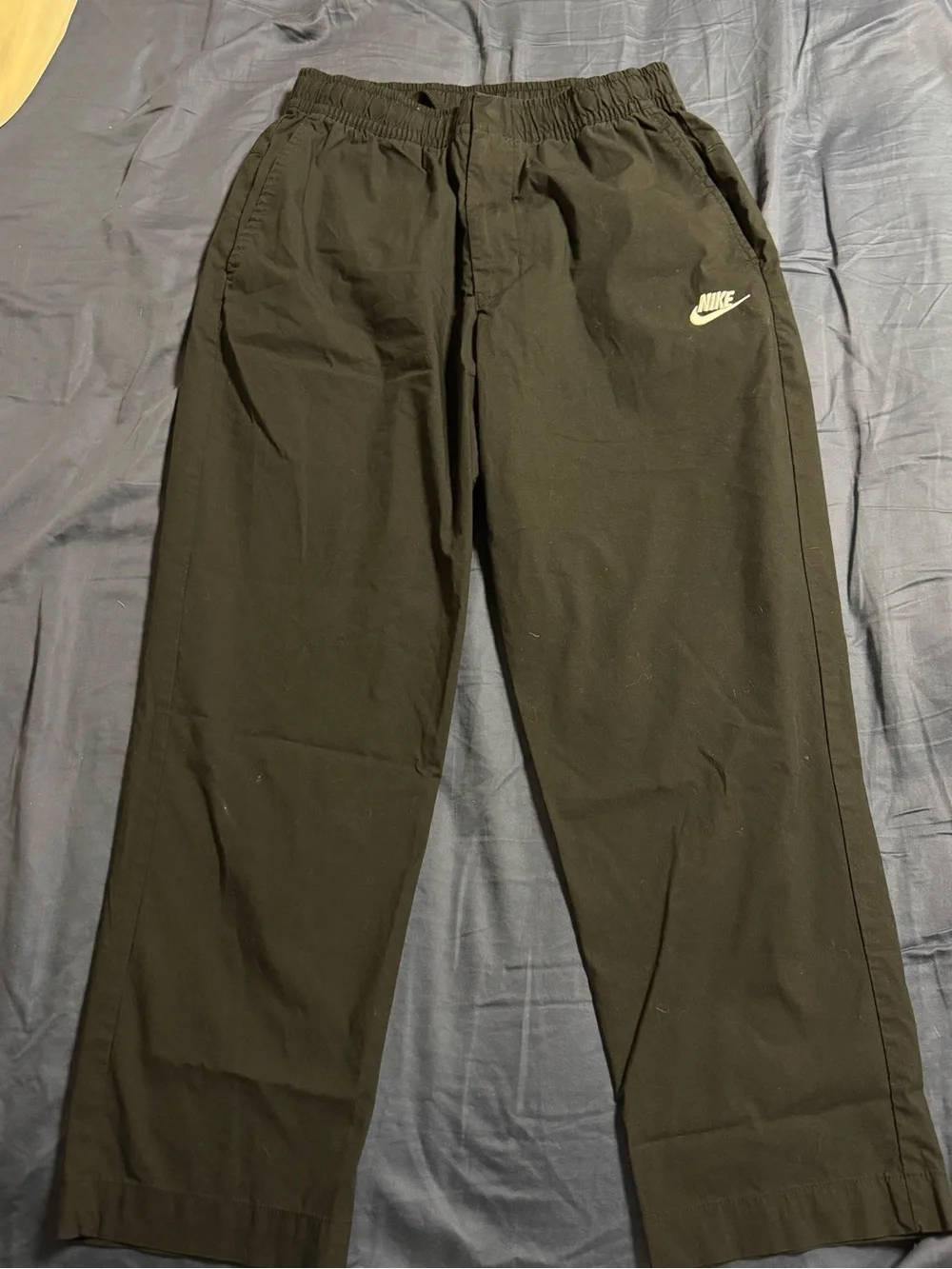 Nike Men's Black Jogger-Style Sweatpants with White Swoosh